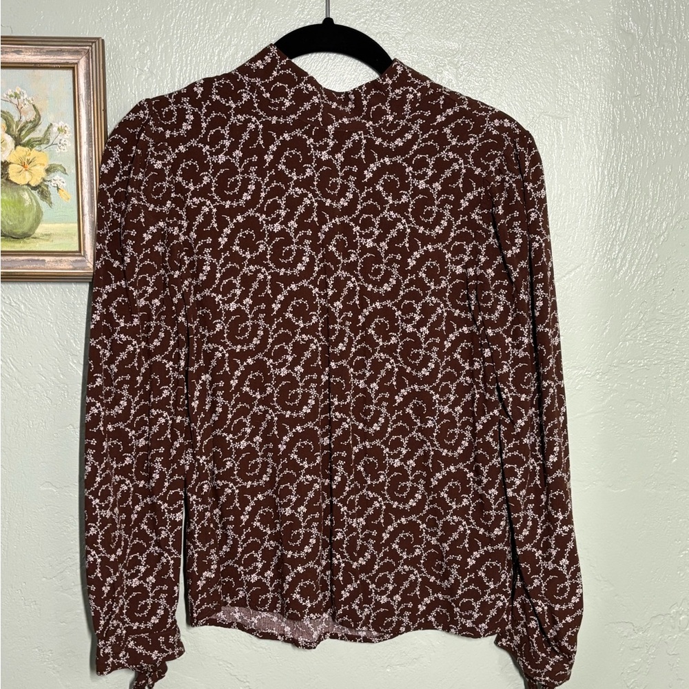 Brown mock neck floral pattern long sleeved